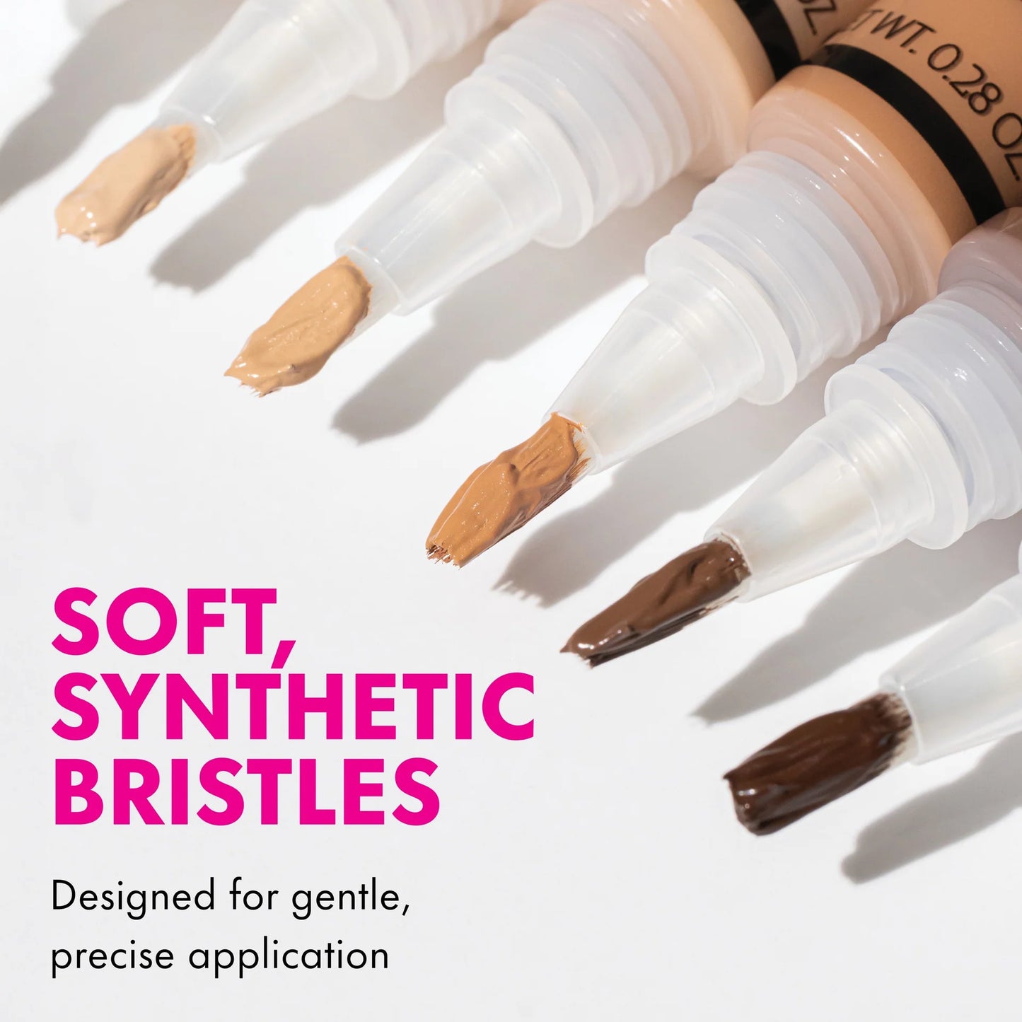 Makeup brushes with soft, synthetic bristles on a white background