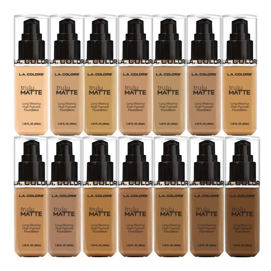 Multiple bottles of L.A. Colors Truly Matte foundation in various shades on a white background.