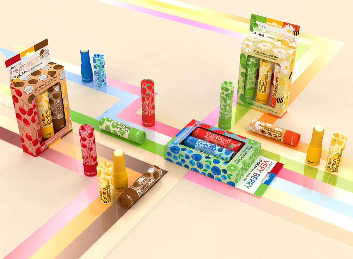 Assorted lip balms and packaging on a colorful geometric background